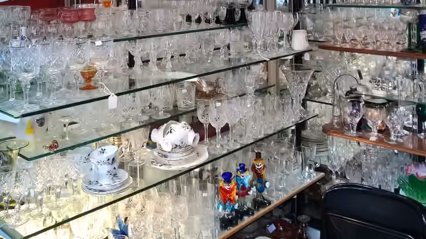 Porcelain and glass displayed at Kaveh’s