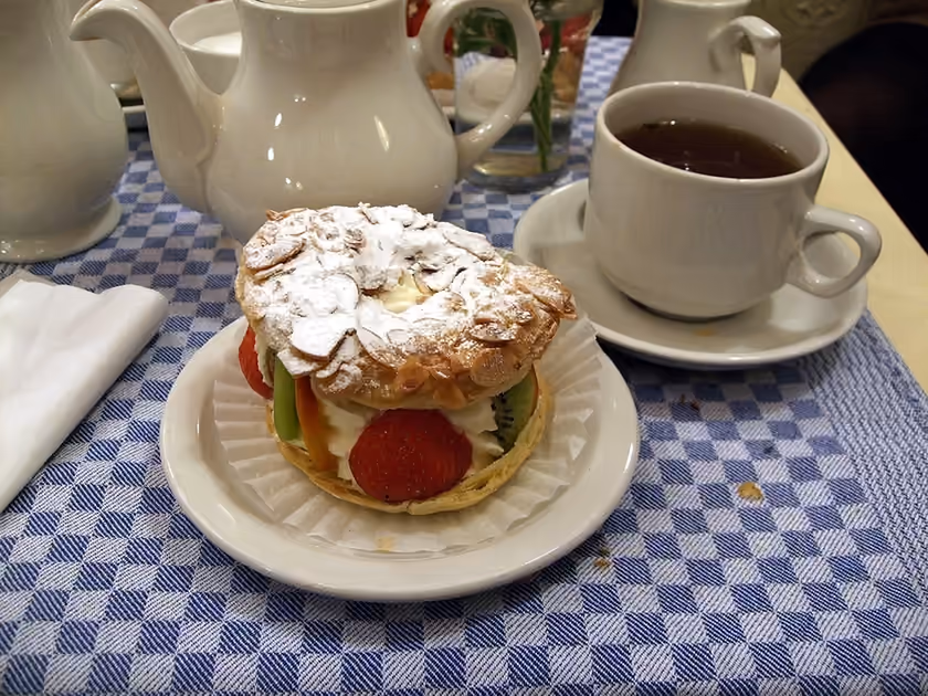 Cake and tea photographed at Maison Bertaux in Soho