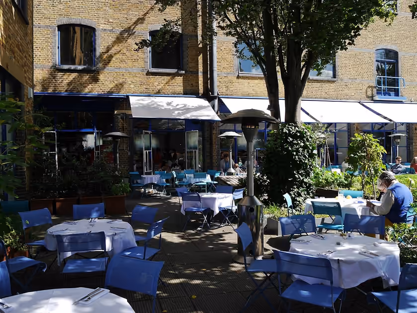 The River Cafe’s outdoor dining area at Thames Wharf
