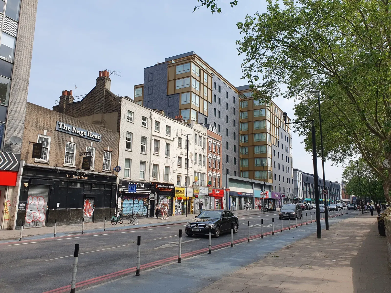 Whitechapel Road in London in June 2023; modern neighborhood context